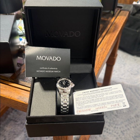 Movado Silver Bracelet Watch with Black Dial